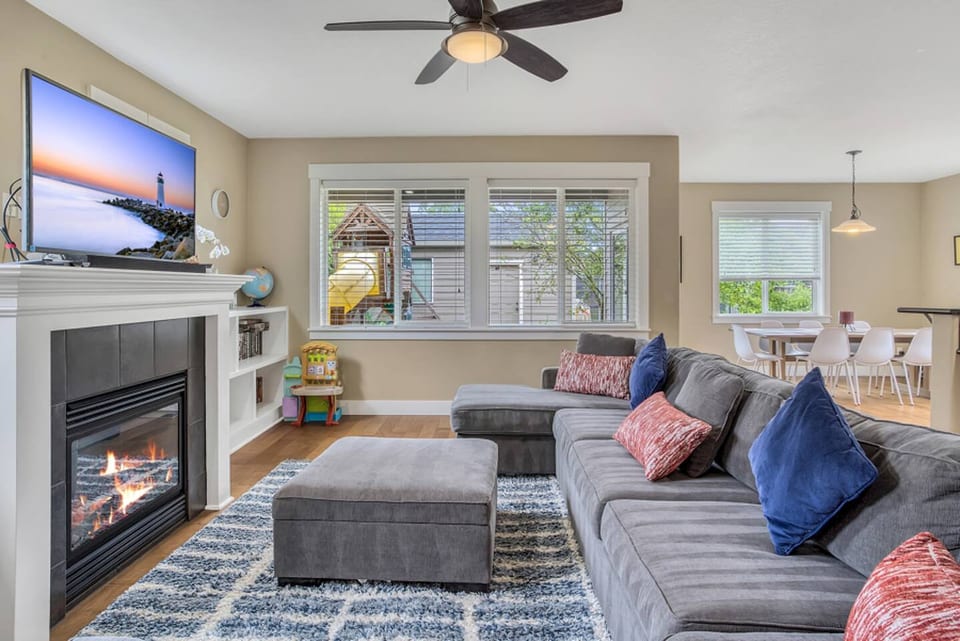 Living room where you can keep an eye on the kids in the backyard