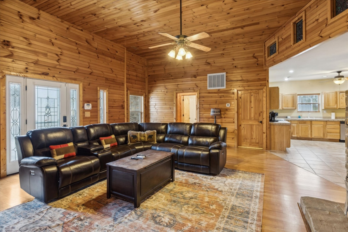 Living Room: Gather around the plush seating and let the woodsy charm embrace your fun-filled days!