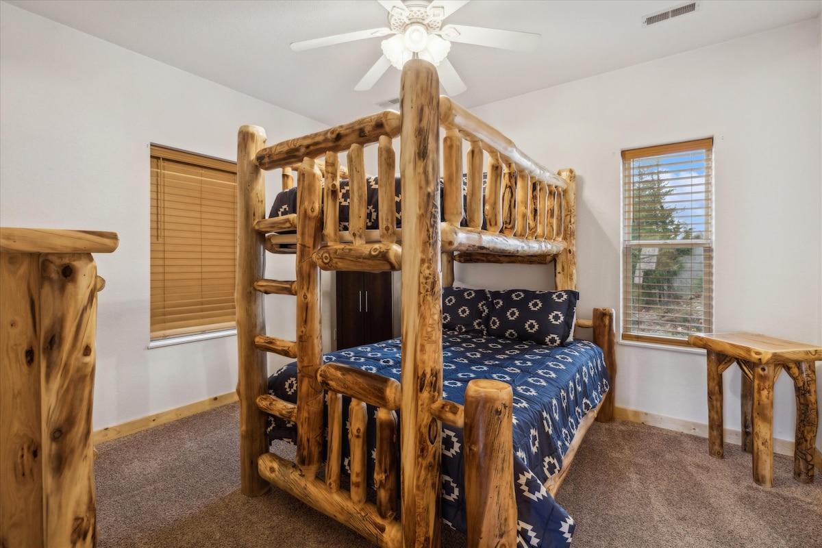 Rustic Retreat Room: Adventure awaits in this stylish bunkbed haven with twin over full, perfect for family fun!