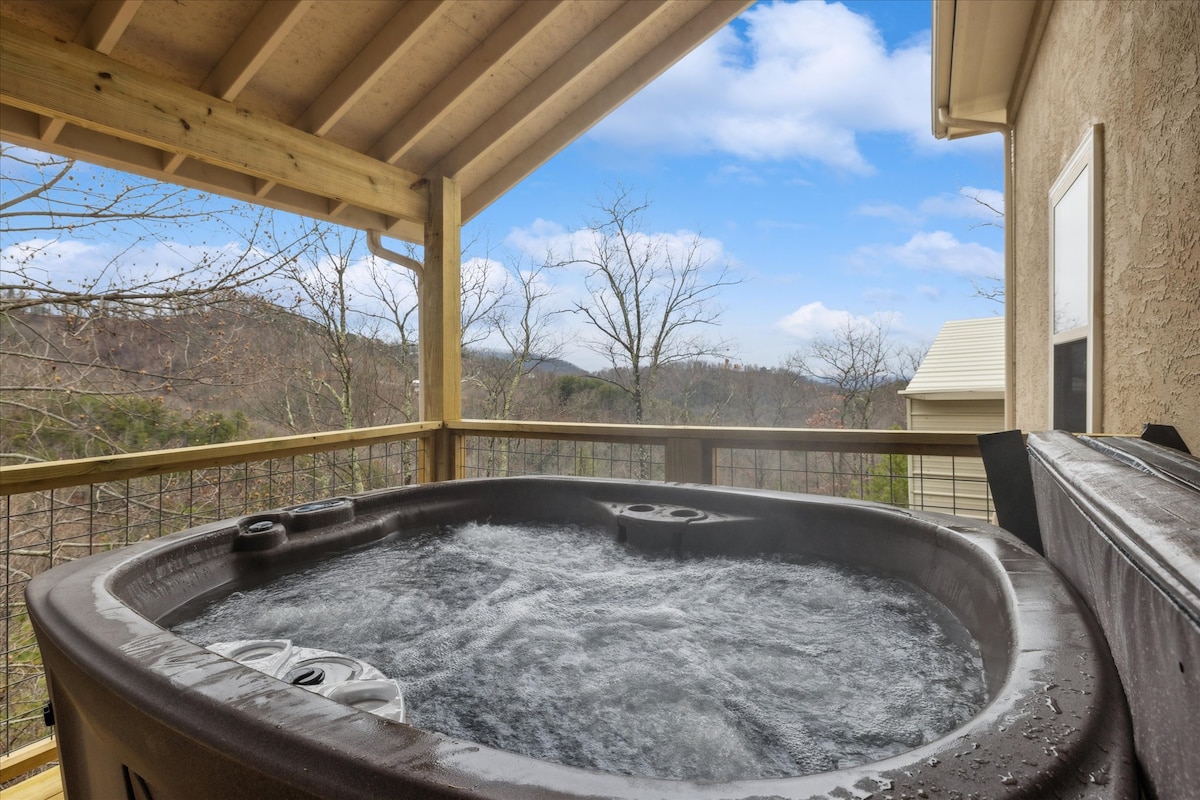Soak in the bubbling waters while enjoying breathtaking mountain views!