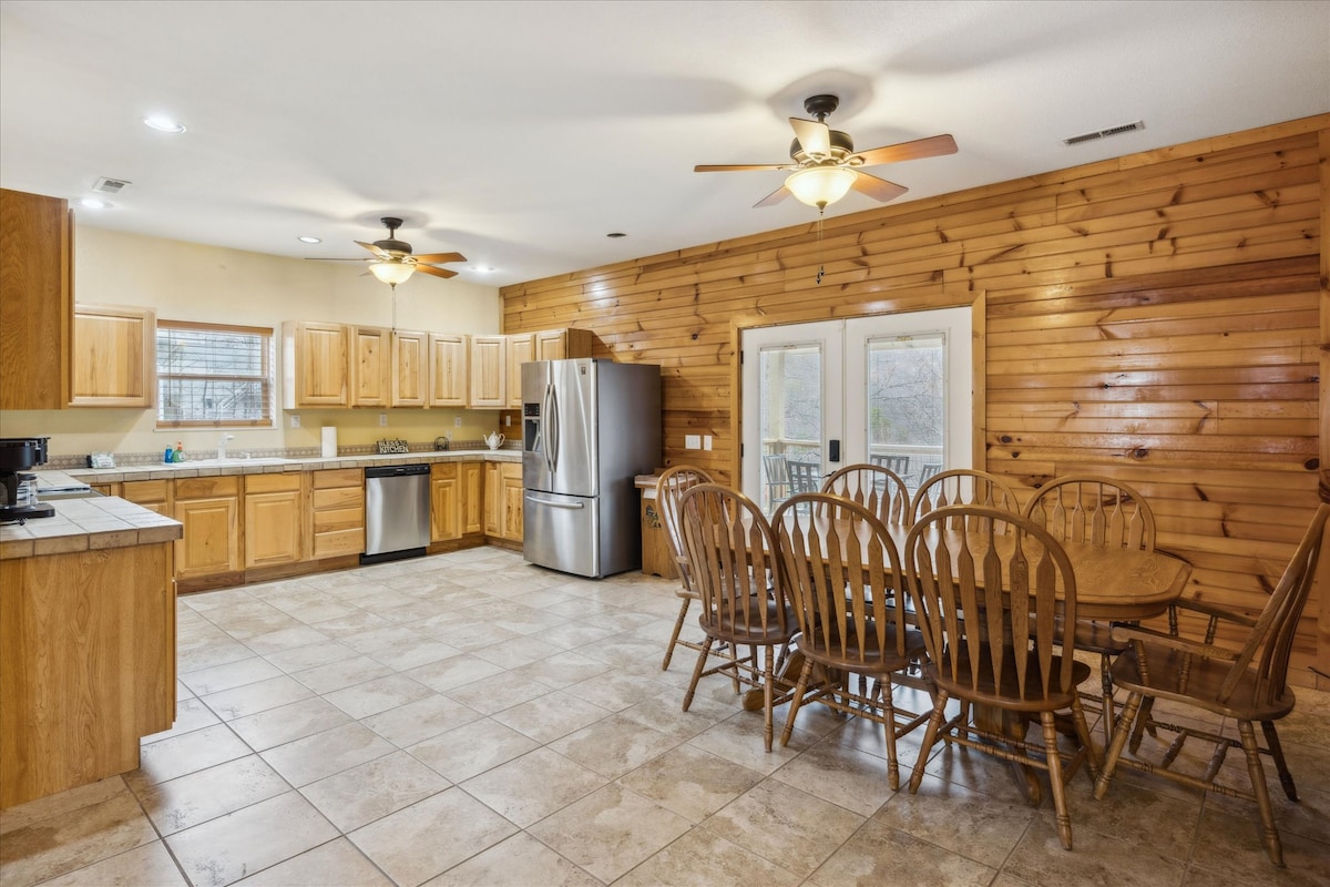 Oversized, spacious kitchen with modern stainless-steel appliances