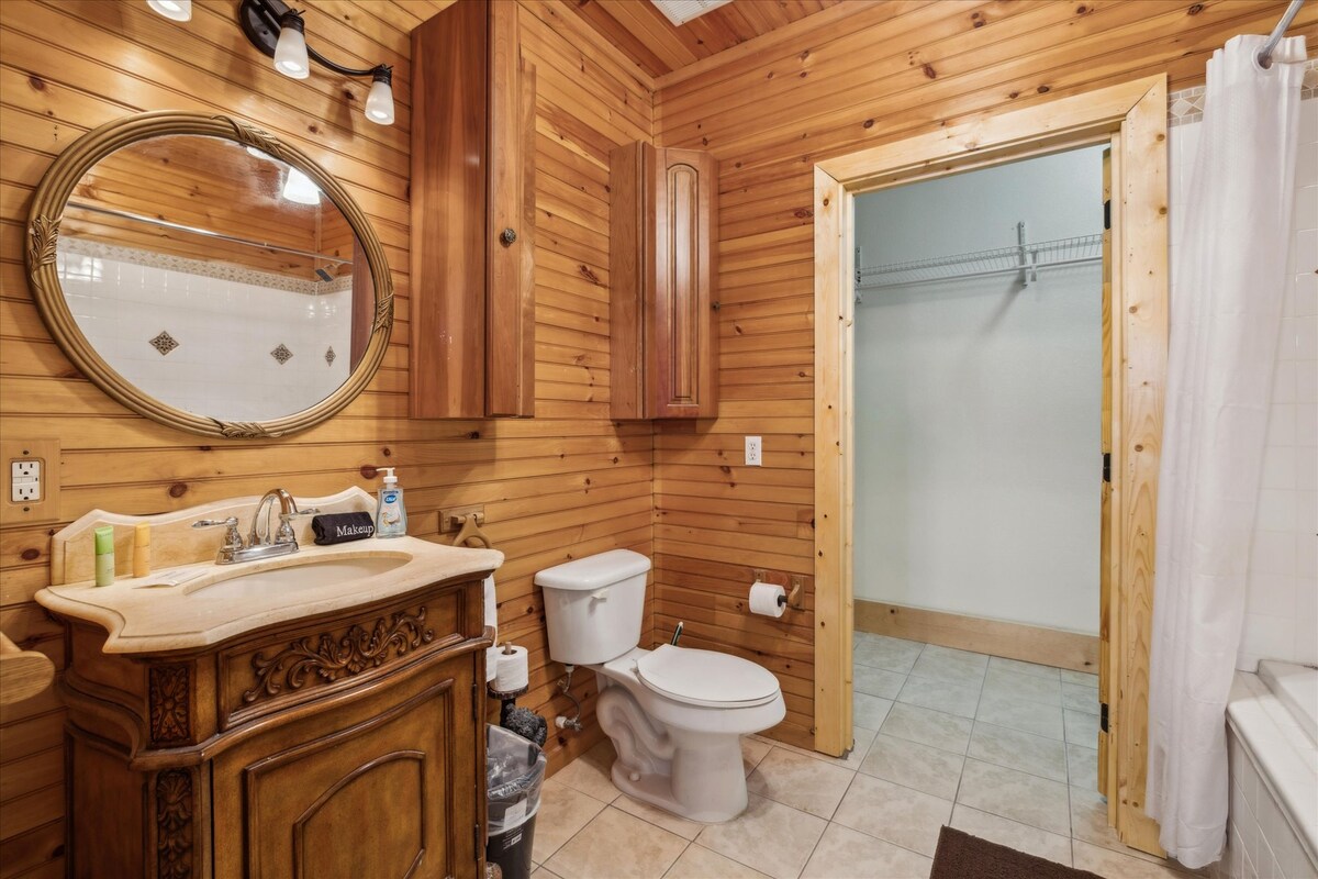 Elegant wooden accents and vintage charm make this space a delightful escape!