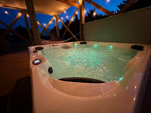 Relax in the brand new 7-seat hot tub