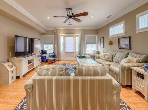 The living area offers a Smart TV with streaming capabilities. We have games and books in the drawers of the coffee table.