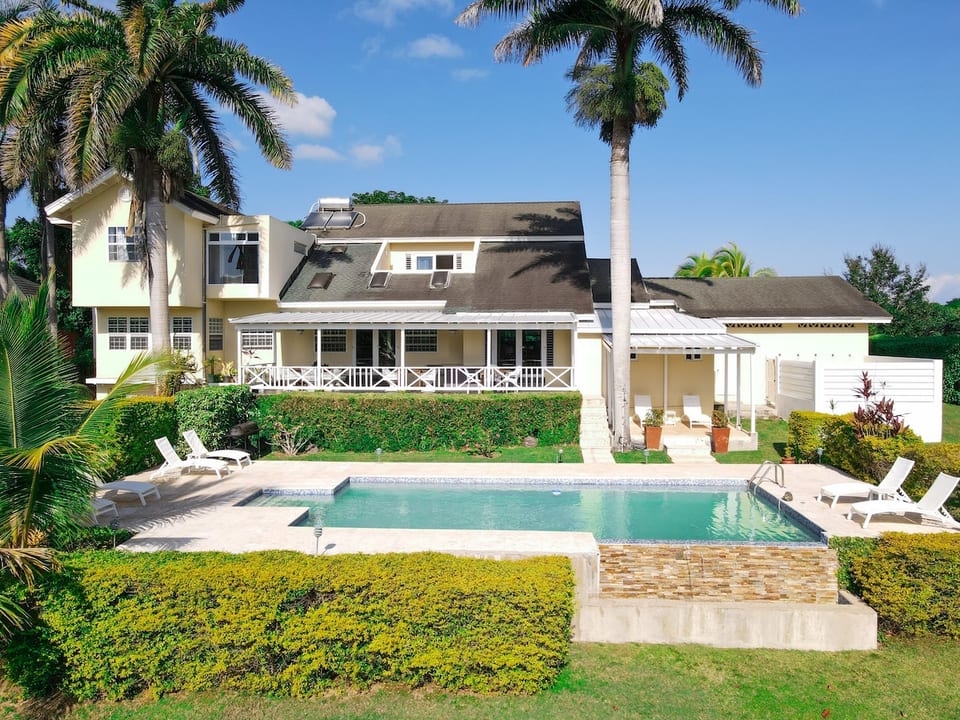 Back of the house with pool and outside patio