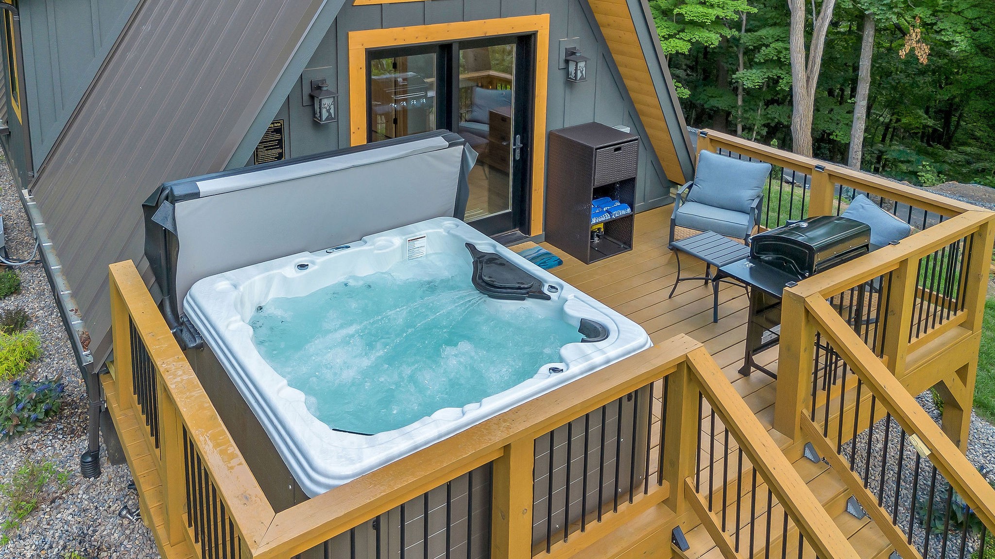 Back deck with Hottub, grill and seating area Back deck with Hottub, grill and seating area - High Peak Aframe Cabin - West Jefferson