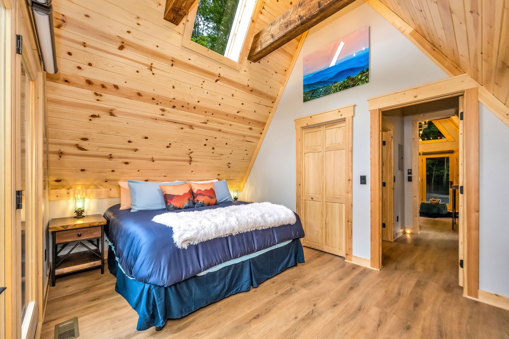 Bedroom with kingsize bed leading to the living area Bedroom with kingsize bed leading to the living area - High Peak Aframe Cabin - West Jefferson