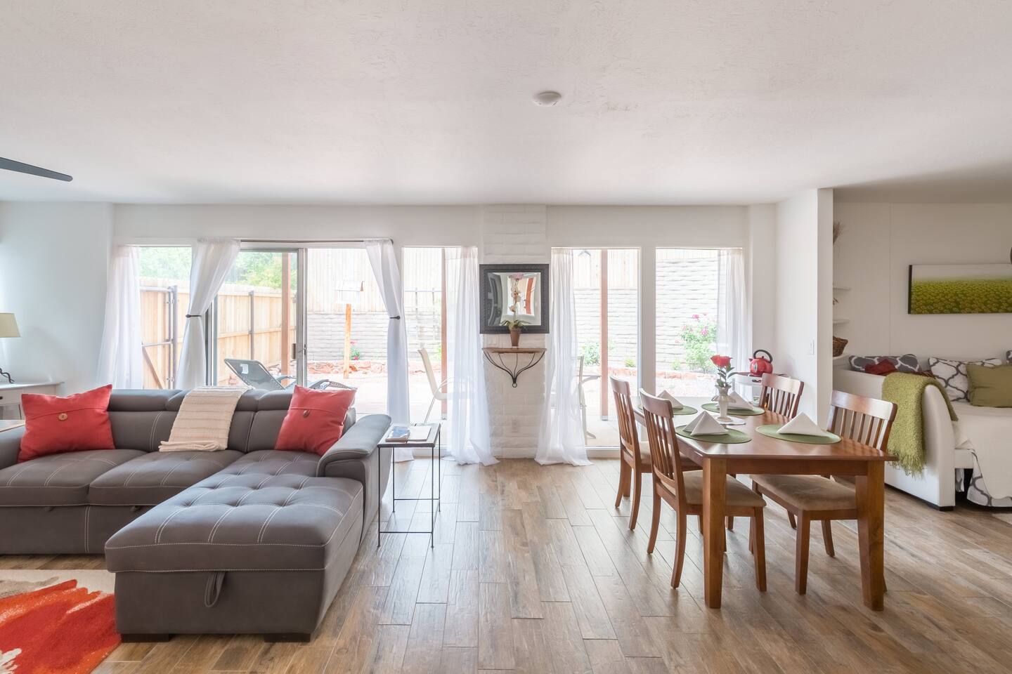 Spacious main living room with access to outdoor enclosed courtyard