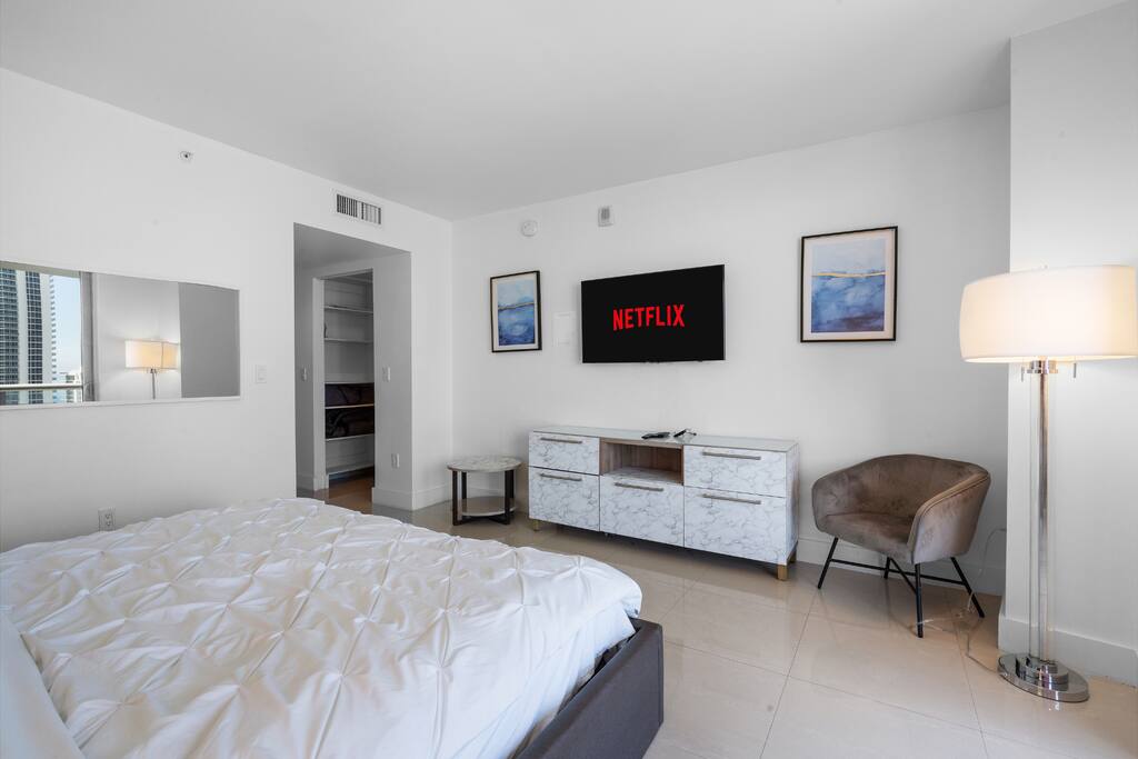 Unwind with your favorite shows on the 48-inch TV, surrounded by a bright, polished setting that feels both elegant and inviting.