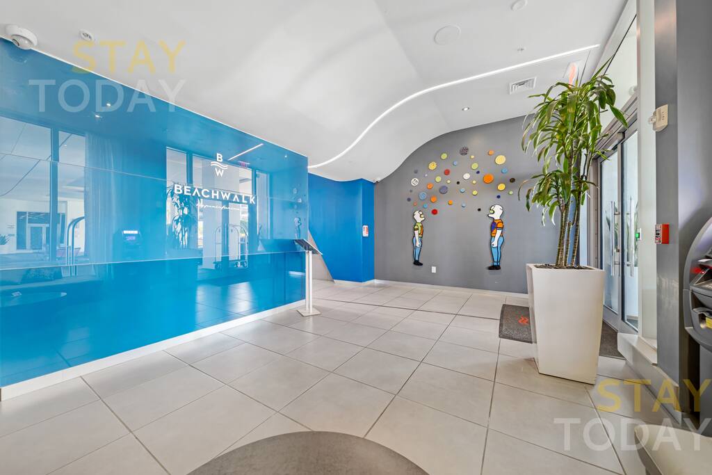 Another view of the hallway, showcasing its elegant design and spacious layout. This well-lit area provides a welcoming atmosphere, offering a smooth transition to the rest of the property.