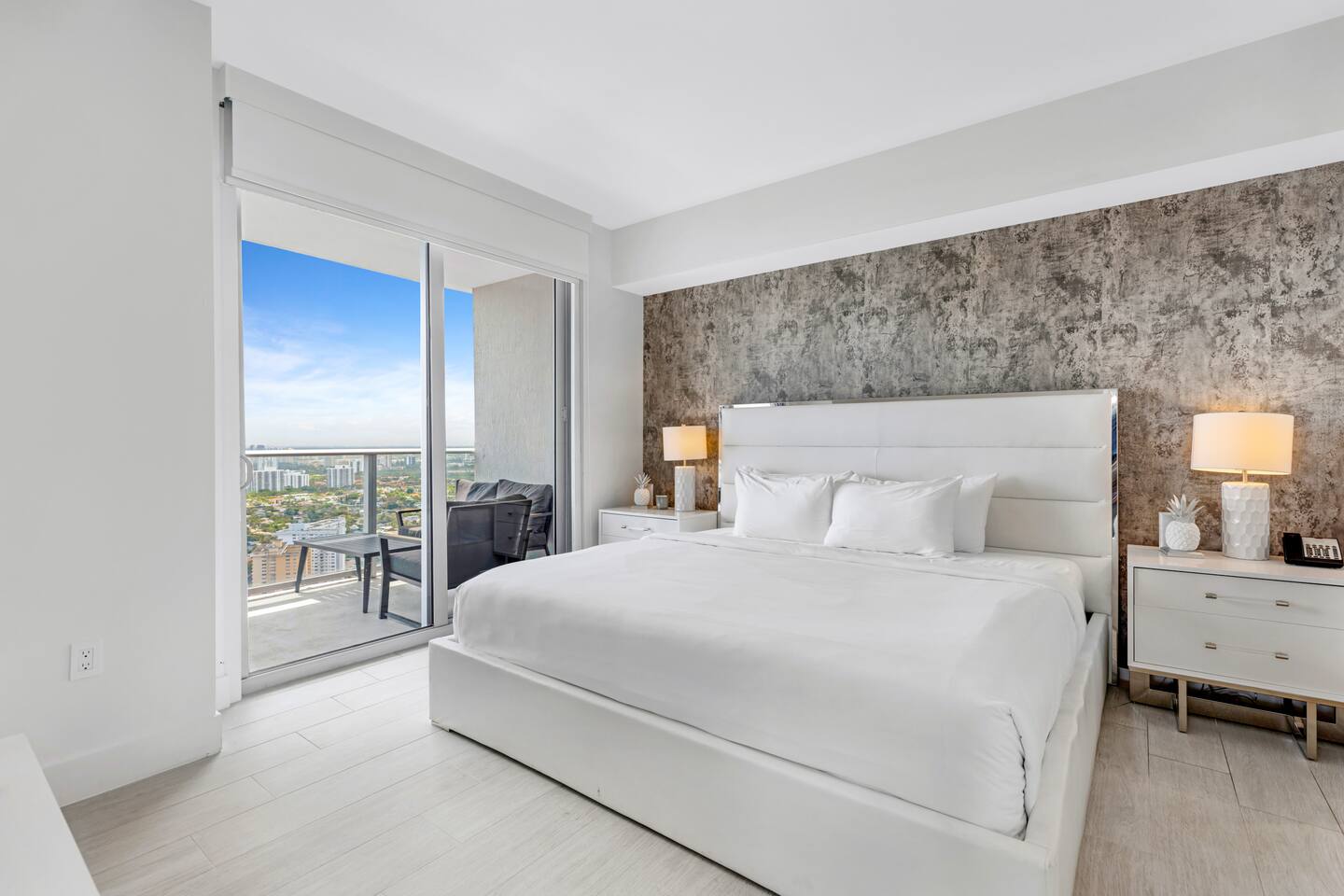Step into the master bedroom featuring a king-size bed, an in-room bathroom, and direct access to a private balcony. This serene space combines comfort and style, perfect for unwinding while enjoying the views.