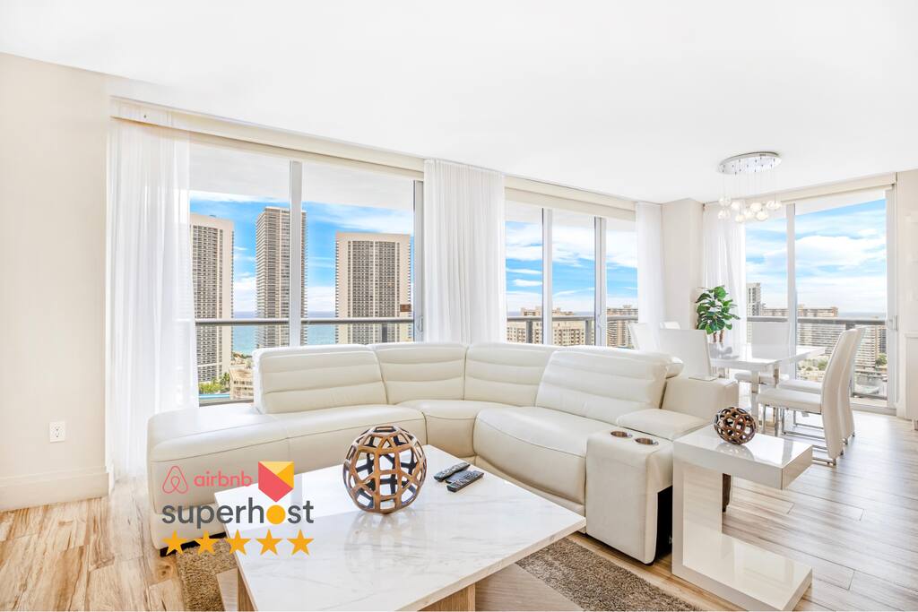 Welcome to our high-floor Beachwalk Resort condo, where floor-to-ceiling windows showcase stunning water and city views. Relax in the spacious living area, enjoy resort amenities, and make the most of your stay just minutes from the beach.