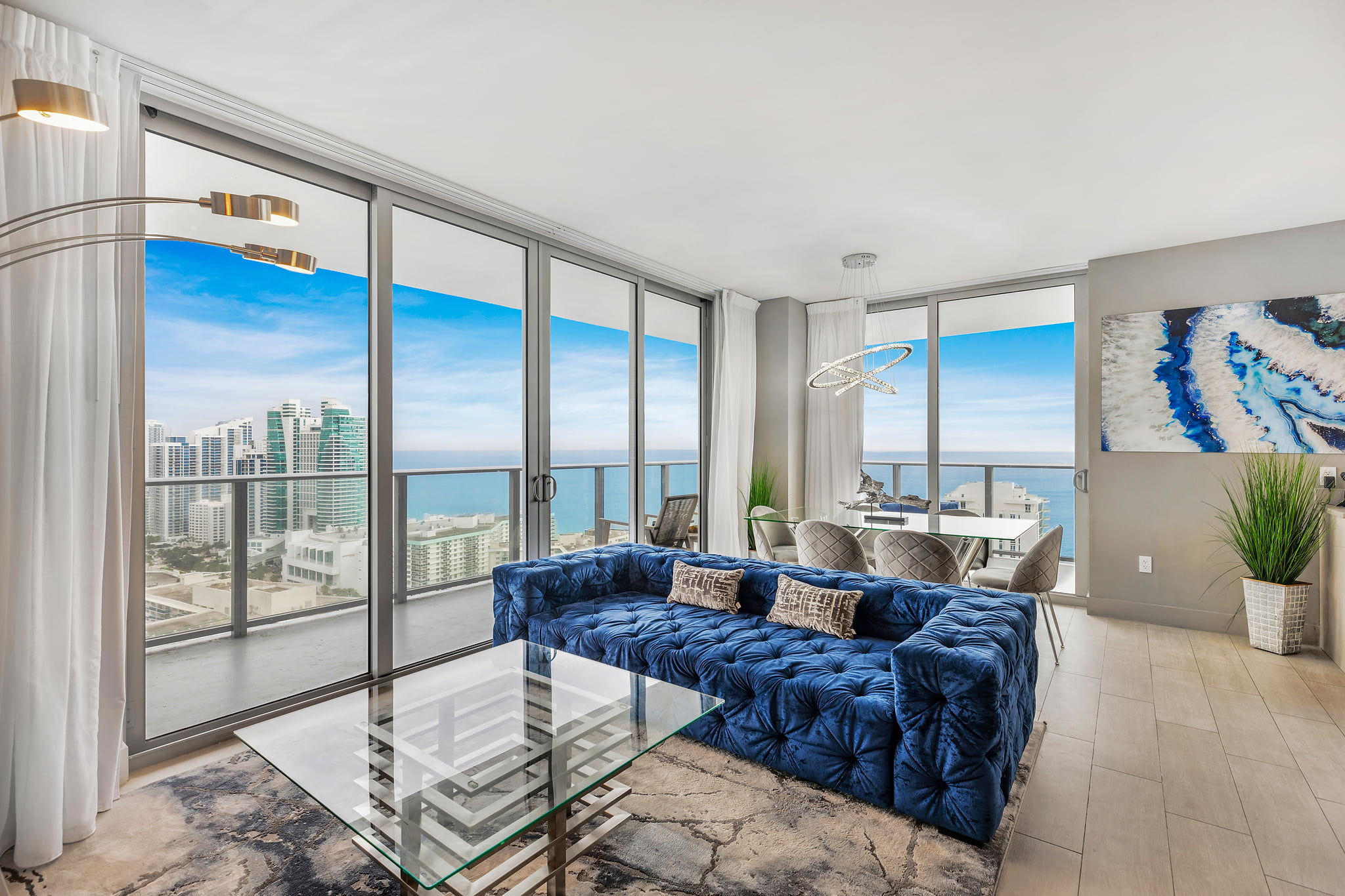 Sleek high-rise retreat with floor-to-ceiling windows and ocean views