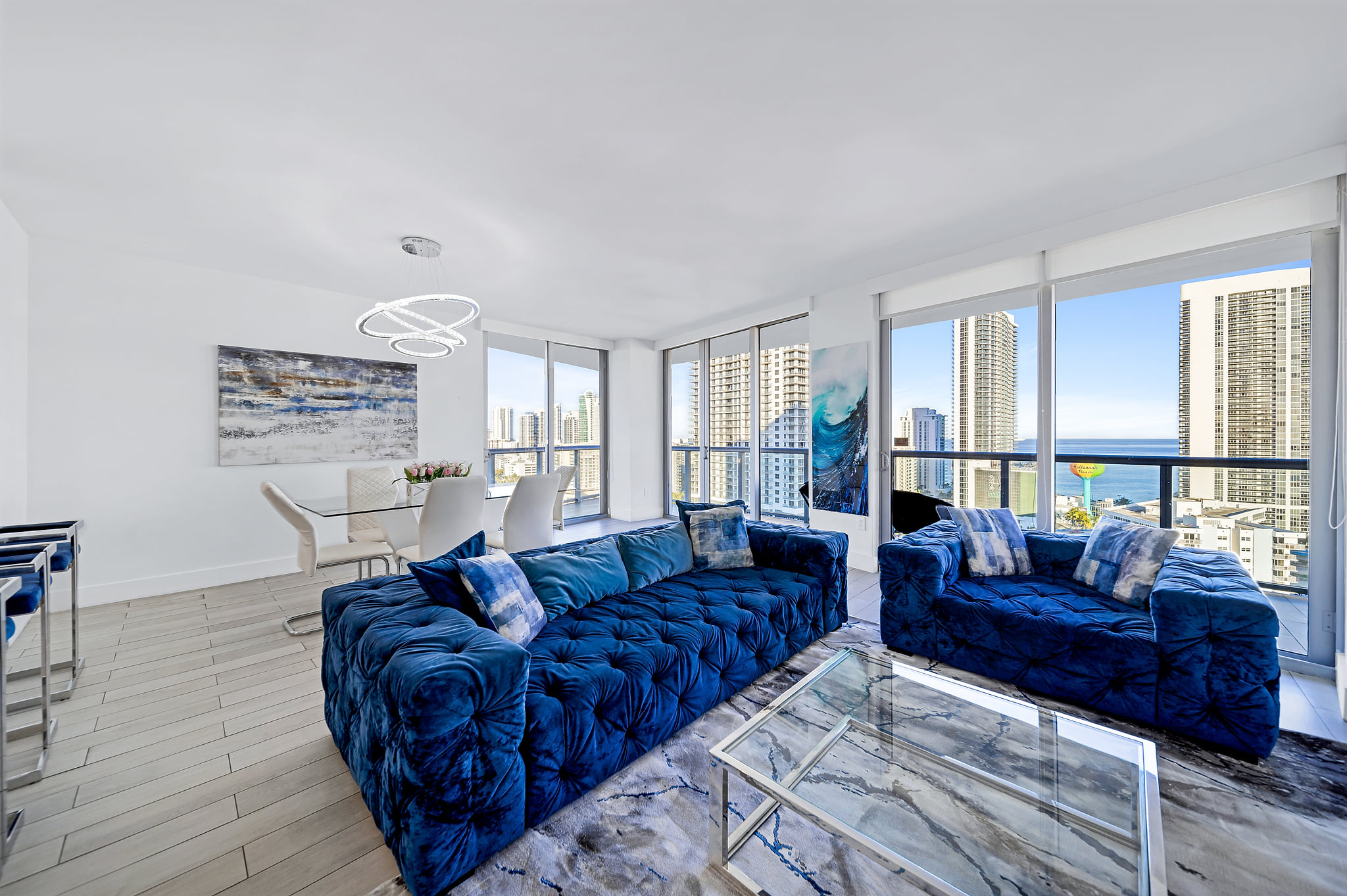 Chic high-rise condo with ocean-view balcony, floor-to-ceiling windows