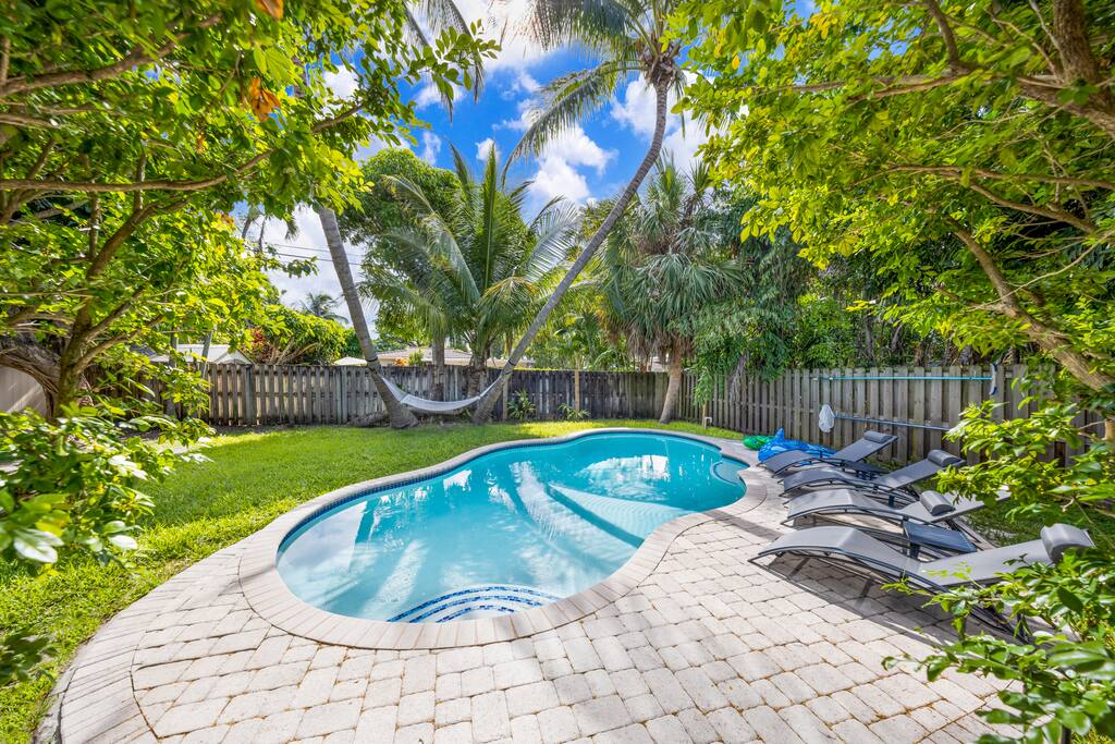 Enjoy the comfort of your own private pool, nestled among trees and designed for both fun and tranquility.