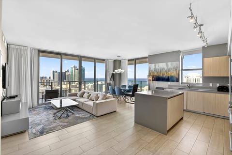 Sleek high-rise retreat with floor-to-ceiling city and ocean views