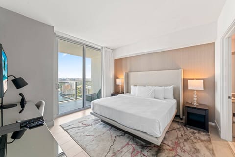 Bright and airy, the master bedroom offers a king-size bed and access to a private balcony with stunning views. Enjoy modern comforts, natural light, and a peaceful retreat after a day exploring the city or beach.