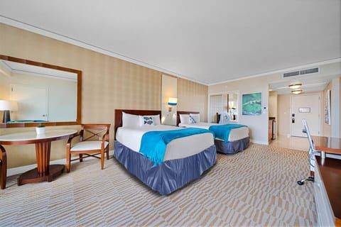 Two comfortable queen-size beds are available for your convenience together with a dining area for two people