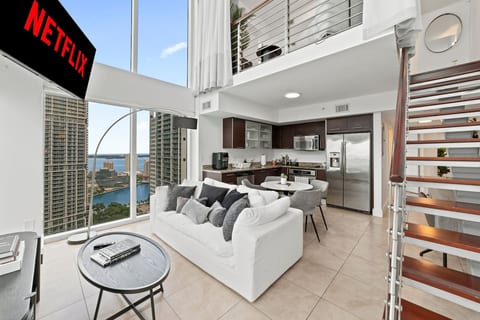 A stylish blend of comfort and sophistication. From the full kitchen to the open lounge and sweeping views outside, every detail is designed to capture the energy of Miami.