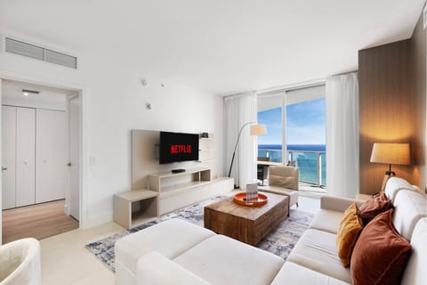 Welcome to your oceanfront escape! This bright, modern suite features a cozy living area, elegant decor, and a private balcony with stunning sea views, perfect for enjoying your morning coffee or relaxing at sunset.