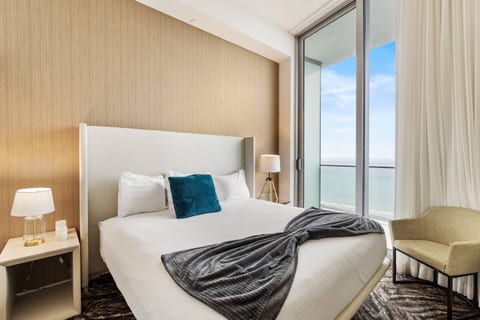 Soft lighting and neutral tones create a soothing atmosphere, perfect for winding down after a day in the sun.