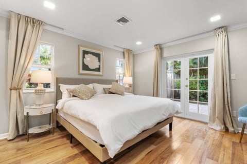 Step into the master bedroom, where a plush King bed, soft lighting, and serene décor create a calming retreat. An in-room bathroom adds privacy and convenience to your stay.