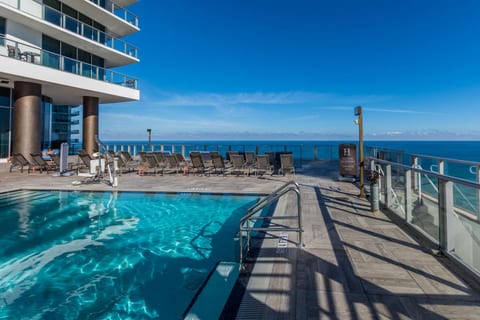 The outdoor pool on the 9th floor offers unobstructed ocean views. With comfortable loungers and private cabanas on a spacious deck, it’s perfect for swimming, sunbathing, or relaxing by the water.