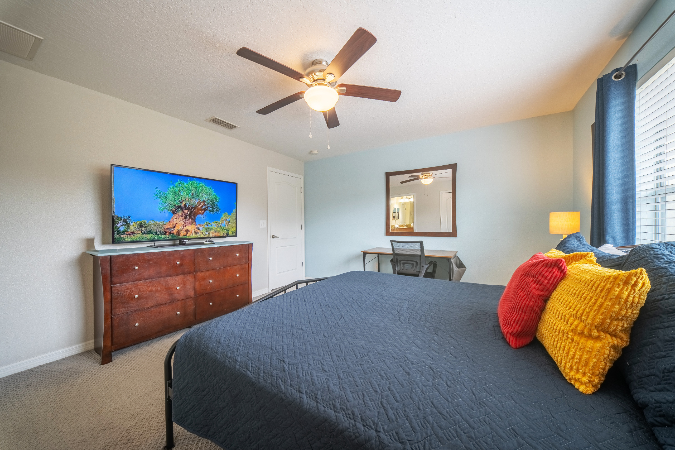 The upstairs master has a full bath, tv and desk. Whether you need a little space or to complete some work, this room will welcome you in.