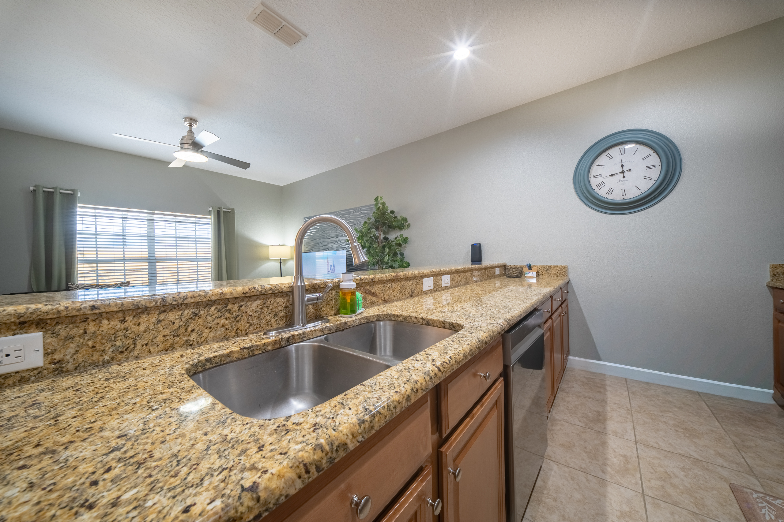Don't miss a thing! The kitchen is open to the living and dining rooms. The large breakfast bar offers additional seating for your family!