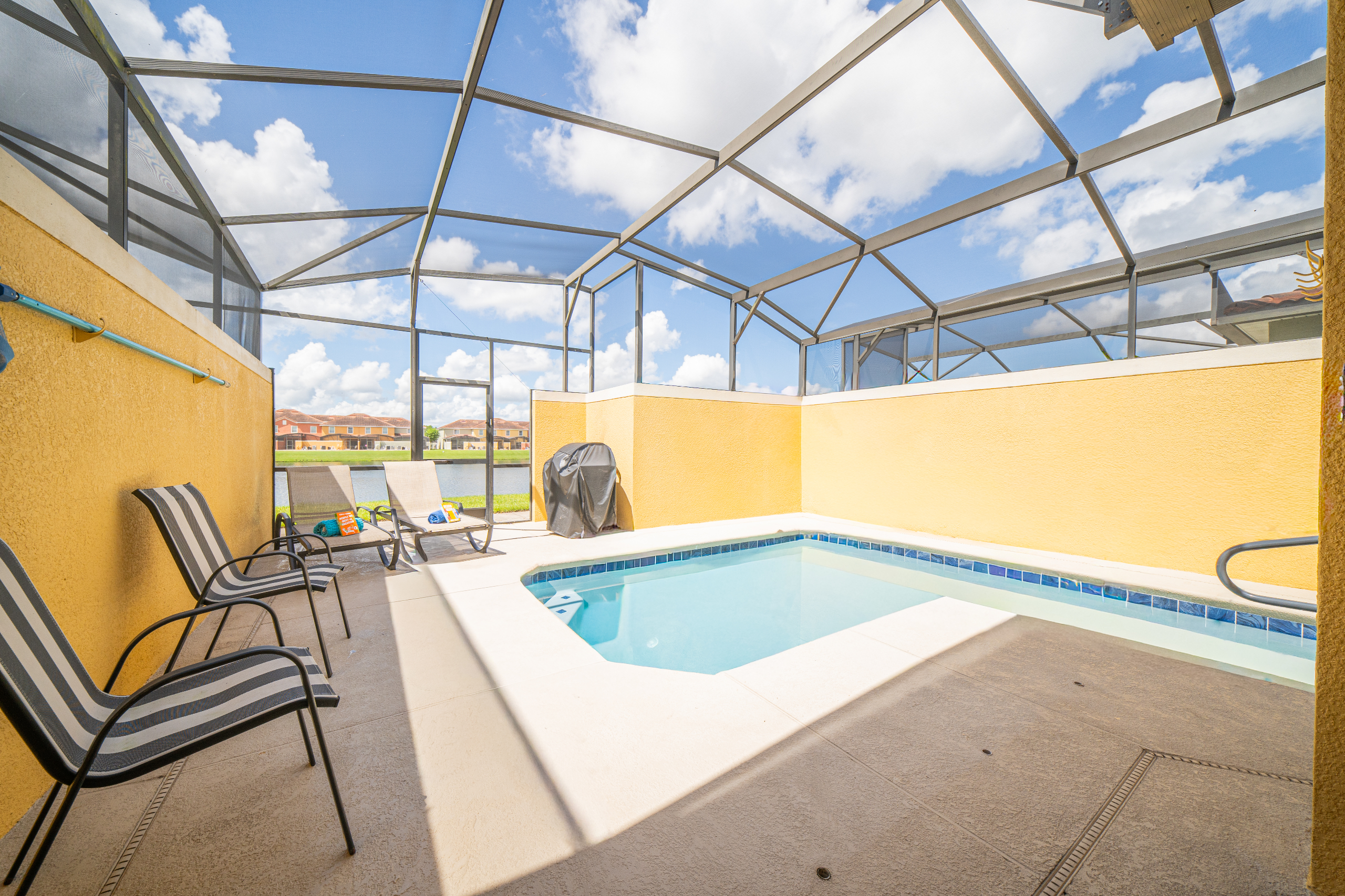 See what makes the setting special: your pool, the lake beyond and no backyard neighbors.