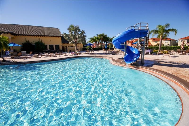 The pristine water of the resort pool invites you in! The water slide and splash pad are perfect for the youngest, or young at heart!