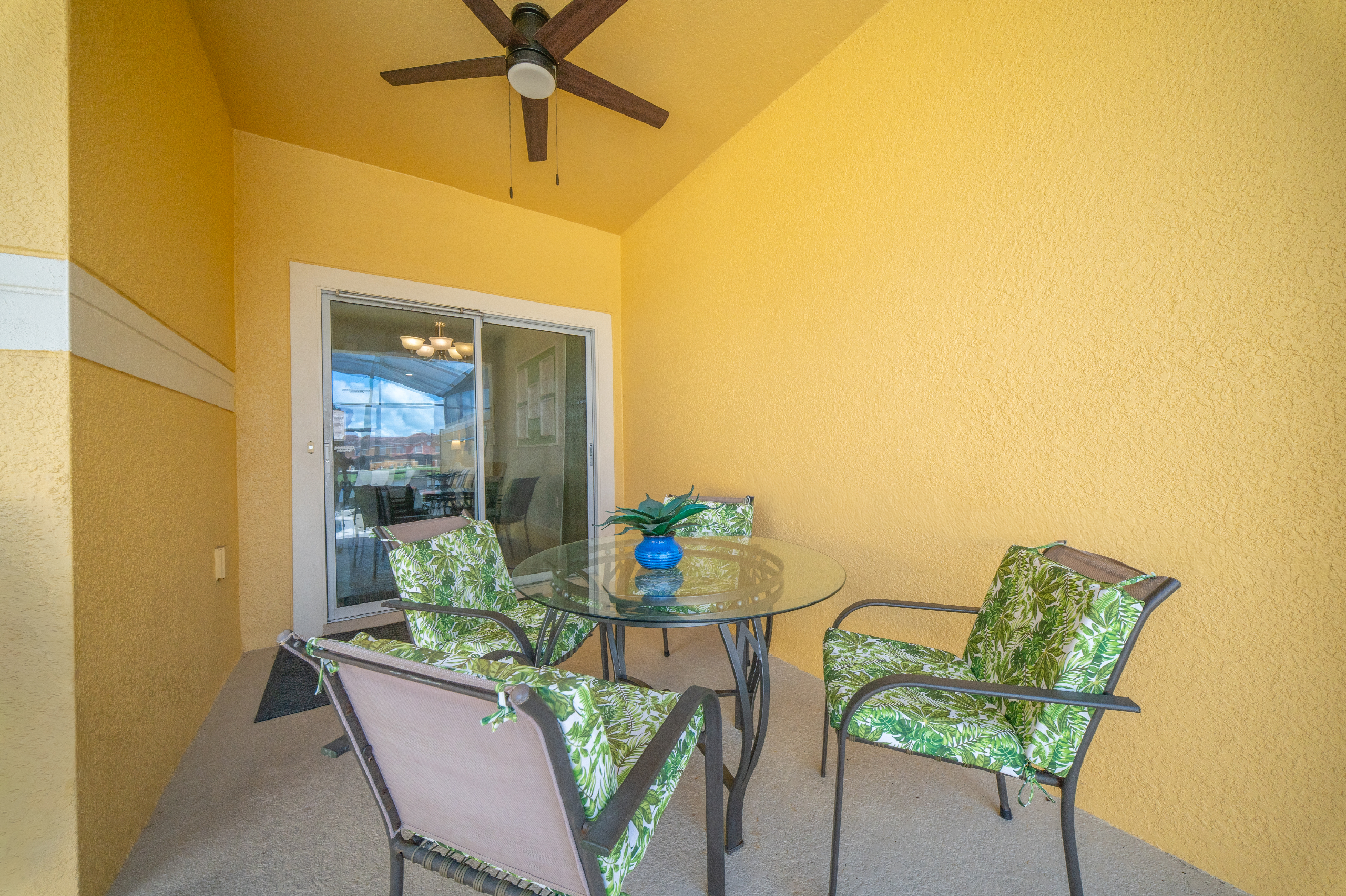 Take a break outdoors under the lanai. Comfy chairs and your own ceiling fan help ease your mind.