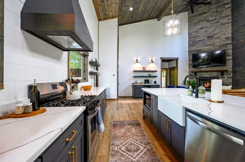 Seamless Entertaining: Open-concept living, kitchen, and dining area- where memories are made