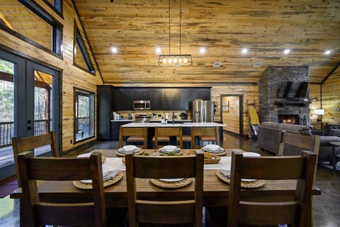 Dining Room: Gather for delightful meals illuminated by stunning natural light and rustic charm!