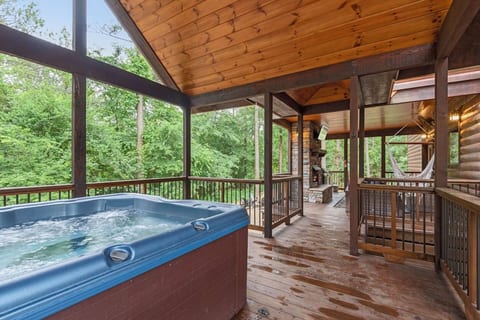 Hot tub!! It's located over a little bridge away from the main deck providing some privacy from the main deck. 