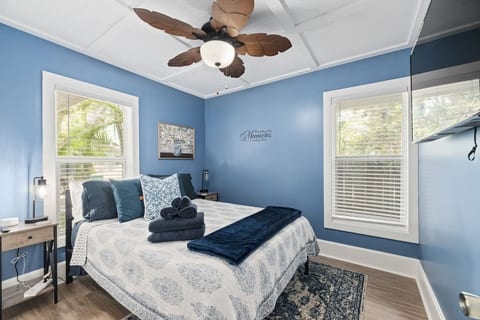 The master bedroom has a queen bed and a 55" TV, plus a large closet.