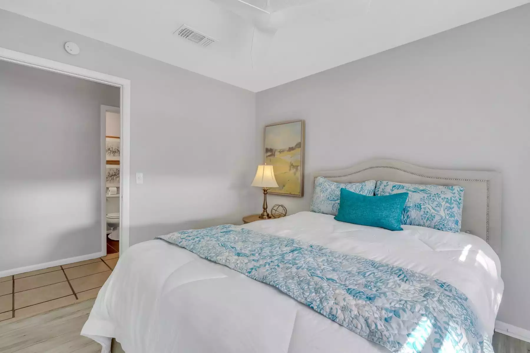 Secondary bedroom with a queen bed. - The Cozy Cottage on St. Simons Island - St Simons Island