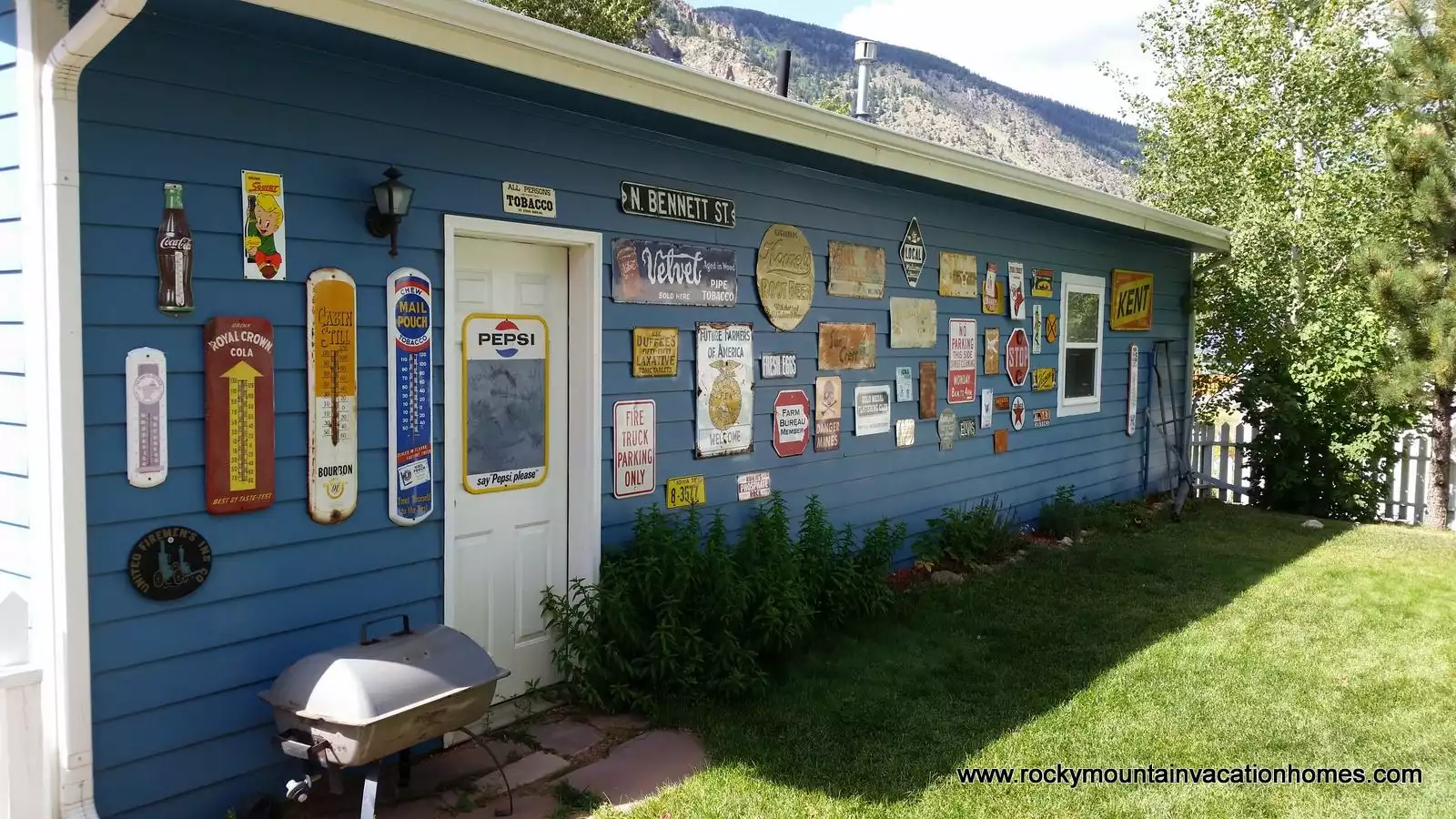 Garage exterior. Do not move or take the signs.