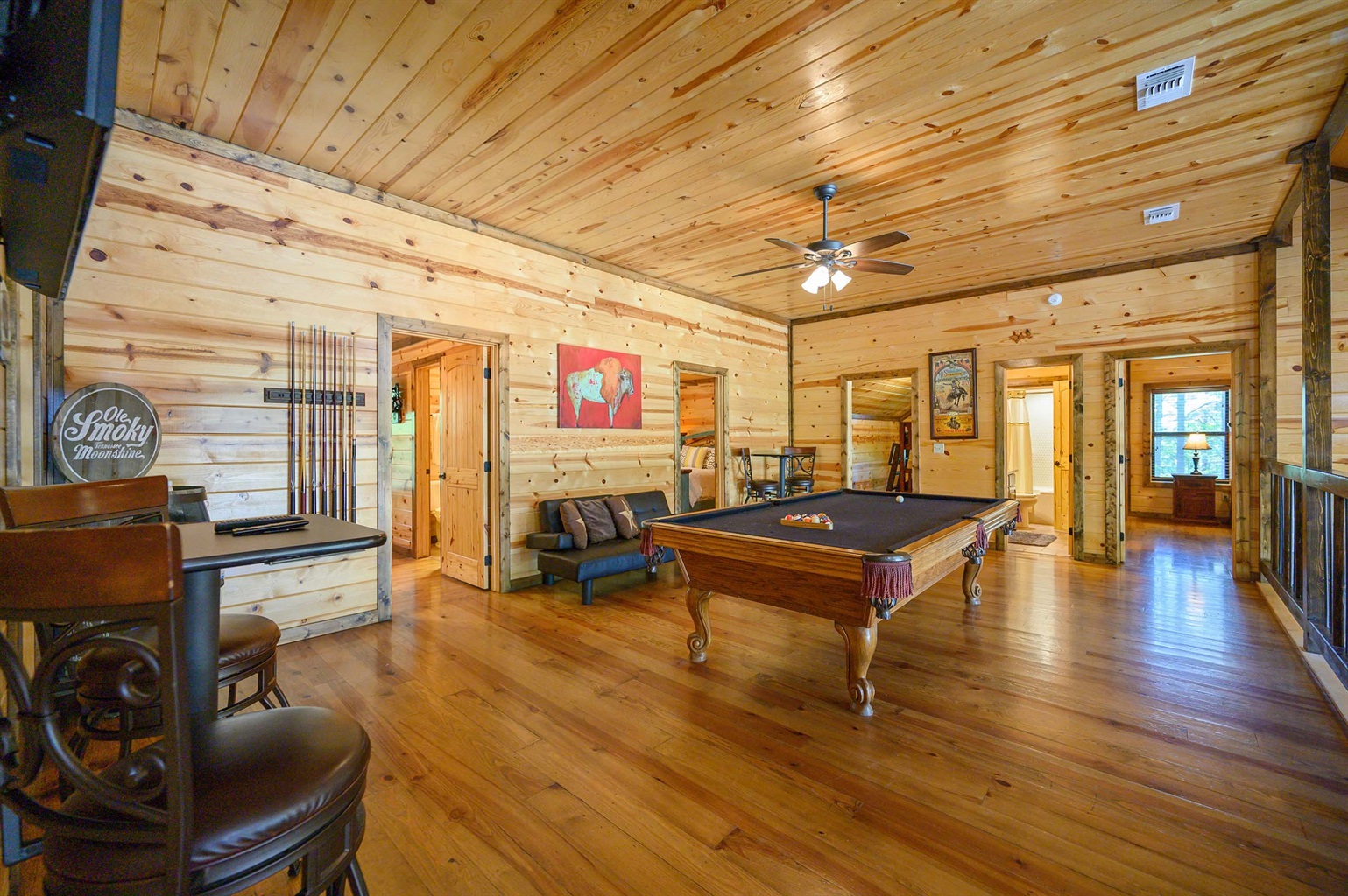 The gaming loft w/ a pool table, arcade games, large TV, board games and sleeper couch is a crowd pleaser The gaming loft w/ a pool table, arcade games, large TV, board games and sleeper couch is a crowd pleaser - Iron Horse Lodge - Broken Bow