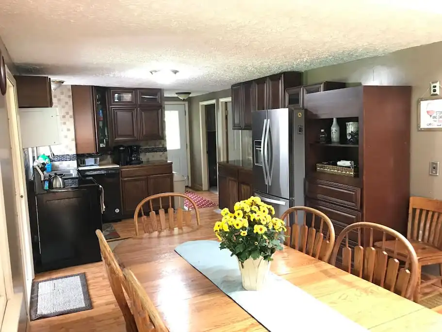 Dining area and kitchen - Serene Port Bay Cottage - Wolcott