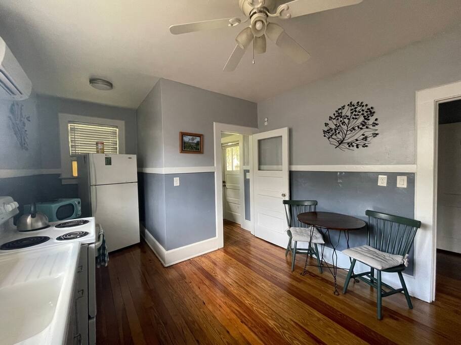 small intimate dining table for 2.  Laundry is in small room at back of kitchen. - Spacious Getaway for 2 with full kitchen/laundry - Jacksonville