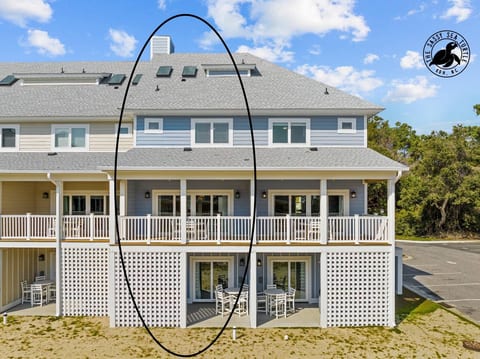 Private ground level patio with hot tub, table and chairs, and.grill.Private 2nd level patio with table and chairs.