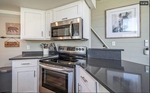Kitchen - full size stove, oven and microwave