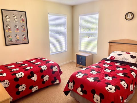 Upstairs Mickey Mouse theme Twin bedroom.