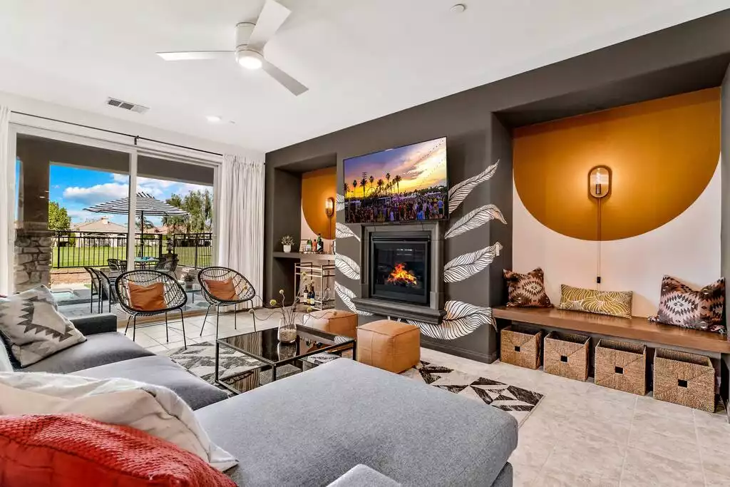 Living room is professionally designated & decorated and has golf course views