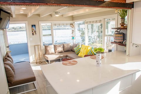 Step inside our Beautiful Ocean VIEW Remodeled home with Sunrise and Sunset Pacific OCEAN VIEWS from EVERY Window!  You will feel like you are on a boat especially when you see dolphins and sailboats going by the front windows.  Hugh Kitchen island.