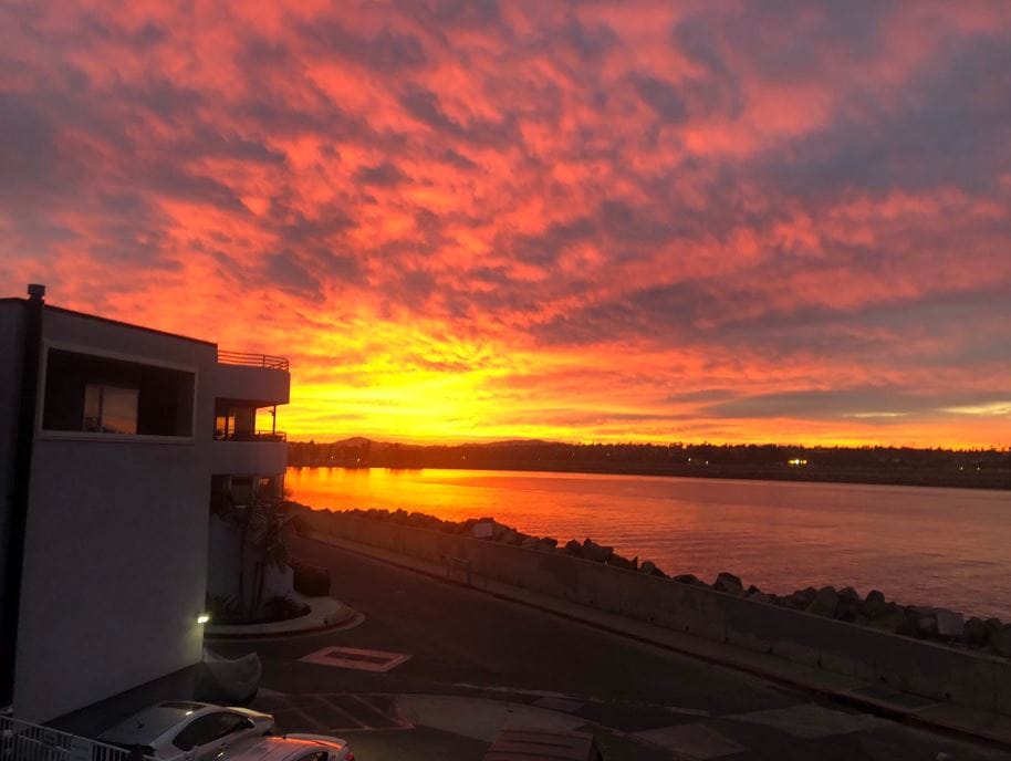 SUNRISE VIEW from MY Living Room & Patio:
Enjoy Sunset & Sunset Mission Beach Ocean Views from Your Front Porch, Living Room, Kitchen, and Bedroom!
Not a professional photo; crazy VIEWS! This is the Sunrise from my living room and front patio