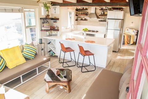 Entertain with Sunrise, Sunset, Ocean Views with Remodeled Open Concept Beach Pad!  Cook up a Storm with HUGH Island/Bar.  Like sailing on a boat with the Water Views, Sail Boats, seals, dolphins, paddle boarders, bikers, joggers in your front yard!