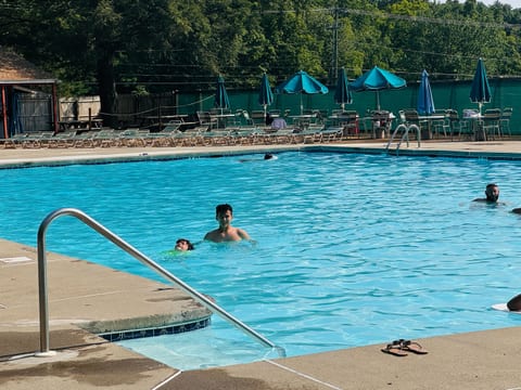 Relax by our sparkling community pool, complete with comfy loungers, shaded umbrellas, kittie pool and jacuzzi.