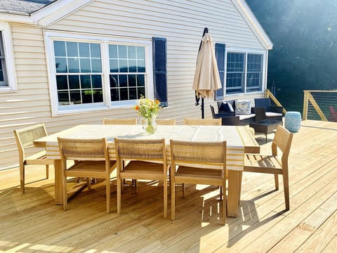 Beautiful new outdoor table with enough seating for 8 people!